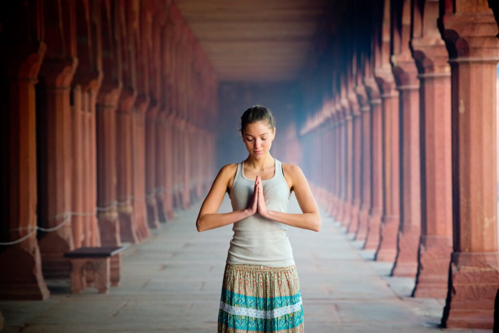 Girl,Meditates,Hands,Folded,In,Namaste